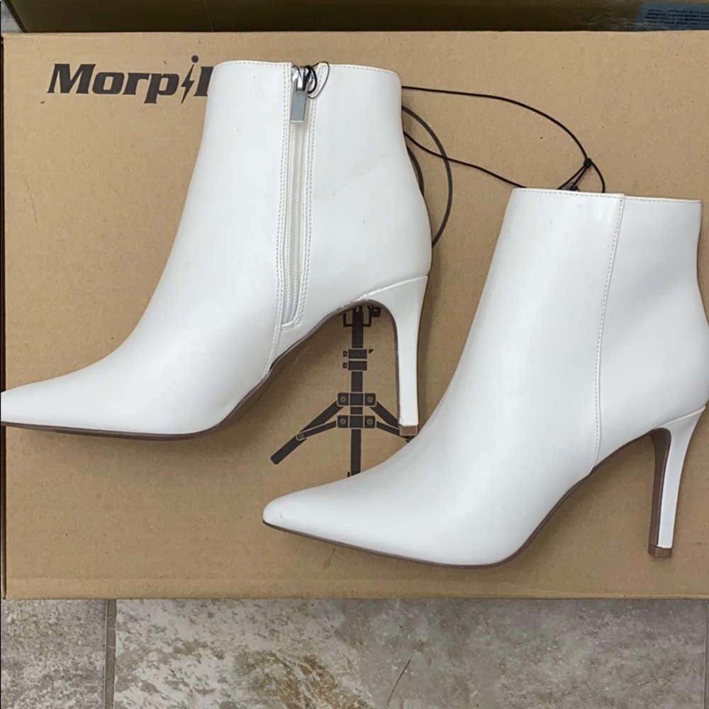White heeled boots